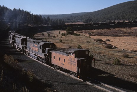 Denver and Rio Grande Western diesel locomotive nos. 5342 and 5383 haul eastbound coal helpers at Mitchell, Colorado, in October, 1980. Photograph by William Botkin, BOTKINW-8-WT-718 © 1980, William Botkin.