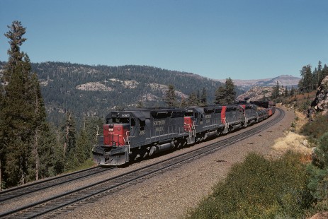 Southern Pacific Railroad locomotive no. 9083 hauls westbound freight at Troy, California, on September 21, 1974. Photograph by William Botkin, BOTKINW-18-WT-32 © 1974, William Botkin.