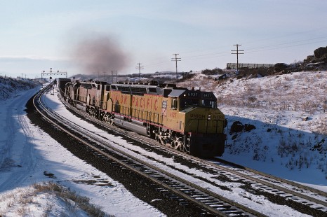 Union Pacific Railroad locomotive no. 6927 hauls eastbound freight at Hermosa, Wyoming, on February 25, 1975. Photograph by William Botkin, BOTKINW-19-WT-147 © 1975, William Botkin.