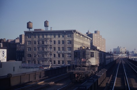 New York Central locomotive no. 242 leads an eastbound commuter train, shot from the cab of the Empire State Express, at 125th Street in New York, New York, on February 7, 1962. Photograph by William Botkin, BOTKINW-10-WT-1 © 1962, William Botkin.