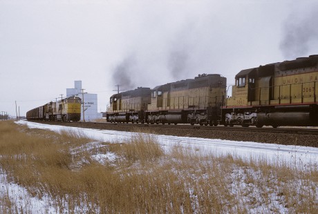Union Pacific Railroad locomotive no. 5014 hauling eastbound freight meets locomotive no. 3034 hauling westbound freight at Point of Rocks, Nebraska, on March 25, 1971. Photograph by William Botkin, BOTKINW-19-WT-16 © 1971, William Botkin.