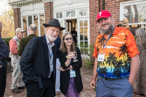 From left: Dennis Livesey, Emily Moser, and Steve Barry enjoy the sunny weather that greeted Conversations' Friday evening reception. (EL)