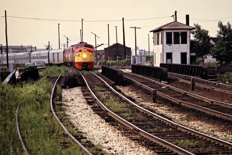 Chicago, Rock Island and Pacific Railroad passenger train no. 12, the <i>Peoria Rocket</i>, crossing the St. Charles Air Line in Chicago, Illinois, on July 15, 1972. Photograph by John F. Bjorklund, © 2016, Center for Railroad Photography and Art. Bjorklund-82-03-14