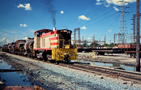 Great Lakes Steel switcher no. 58 with bottle train in Ecorse, Michigan, on June 19, 1977. Photograph by John F. Bjorklund, © 2016, Center for Railroad Photography and Art. Bjorklund-80-26-17