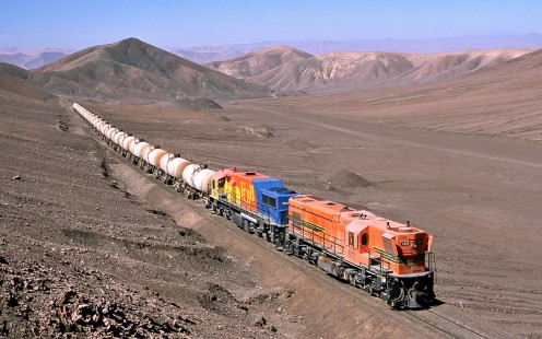 Antofagasta & Bolivia Railway (FCAB) diesel locomotive no. 1411W heads a suphuric acid train through the Atacama Desert heading for the port at Mejillones, Chile, on April 25, 2016. Miller will present his photography from around the world at the Center's <a href="http://www.railphoto-art.org/conferences/conversations-2017/" rel="nofollow">Conversations 2017 conference.</a>