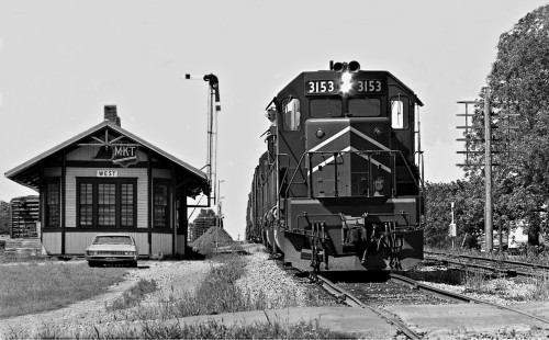 Southbound Missouri Pacific Railroad freight train waits for meet at West, Texas, in August 1970. Road shared Missouri–Kansas–Texas Railroad trackage from Waco to Taylor. Photograph by J. Parker Lamb, © 2016, Center for Railroad Photography and Art. Lamb-02-064-02