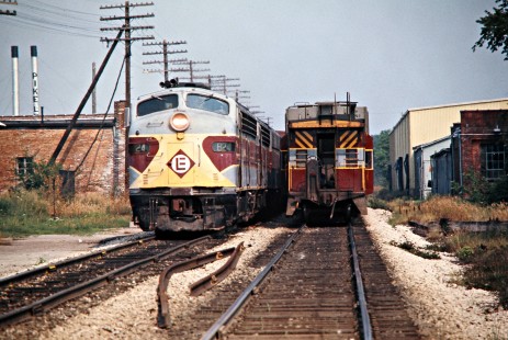 Eastbound and westbound Erie Lackawanna Railway freight trains at Akron, Indiana, on June 28, 1975. Photograph by John F. Bjorklund, © 2016, Center for Railroad Photography and Art. Bjorklund-54-30-20