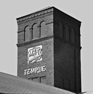 Closeup view of Missouri–Kansas–Texas Railroad (of Texas) emblem on station of Temple, Texas (all early Texas railroads were required to have distinct in-state names) in August 1980. Photograph by J. Parker Lamb, © 2016, Center for Railroad Photography and Art. Lamb-02-046-07