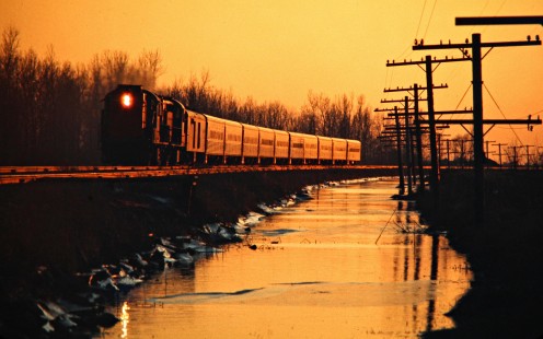 Eastbound Canadian National Railway passenger train near Stoney Point, Ontario, on April 6, 1975. Photograph by John F. Bjorklund, © 2015, Center for Railroad Photography and Art. Bjorklund-20-03-05