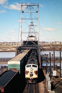 Conrail freight trains crossing Maumee River in Toledo, Ohio, on April 3, 1977. Photograph by John F. Bjorklund, © 2016, Center for Railroad Photography and Art. Bjorklund-80-18-20