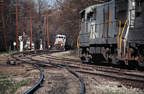 Westbound Louisville and Nashville Railroad freight train meets eastbound LN freight at Tower HK in Anchorage, Kentucky, on April 9, 1977. Photograph by John F. Bjorklund, © 2016, Center for Railroad Photography and Art. Bjorklund-71-02-09