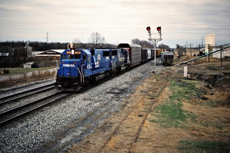 Westbound Conrail freight train in Brimfield, Indiana, on April 4, 1987. Photograph by John F. Bjorklund, © 2015, Center for Railroad Photography and Art. Bjorklund-30-13-04