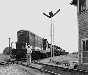 Northbound Southern Railway local freight train gets orders from tower operator at the crossing with the Gulf, Mobile and Ohio Railroad at Laurel, Mississippi, in June 1955. Photograph by J. Parker Lamb, © 2016, Center for Railroad Photography and Art. Lamb-01-114-10