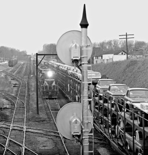 Northbound Seaboard Air Line train no. 88 passes open auto rack cars on southbound train no. 27 at Boylan tower in Raleigh, North Carolina, in November 1962. Photograph by J. Parker Lamb, © 2016, Center for Railroad Photography and Art. Lamb-01-070-12