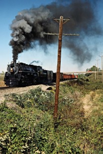 Westbound Ohio Central freight train with former Grand Trunk Western Railroad locomotive no. 6325 at Coshocton, Ohio, on October 6, 2002. Photograph by John F. Bjorklund, © 2016, Center for Railroad Photography and Art. Bjorklund-78-07-11