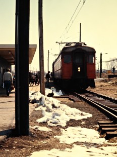 Westbound South Shore passenger train at station in South Bend, Indiana, on March 26, 1977. Photograph by John F. Bjorklund, © 2015, Center for Railroad Photography and Art. Bjorklund-42-04-05