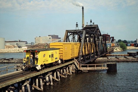 Green Bay and Western Railroad freight train crossing bridge in Green Bay, Wisconsin, on May 15, 1982. Photograph by John F. Bjorklund, © 2015, Center for Railroad Photography and Art. Bjorklund-43-15-08