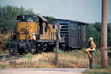 Eastbound Chicago and North Western Railway freight train in Springfield, Minnesota, on July 22, 1976. Photograph by John F. Bjorklund, © 2015, Center for Railroad Photography and Art. Bjorklund-25-04-11.