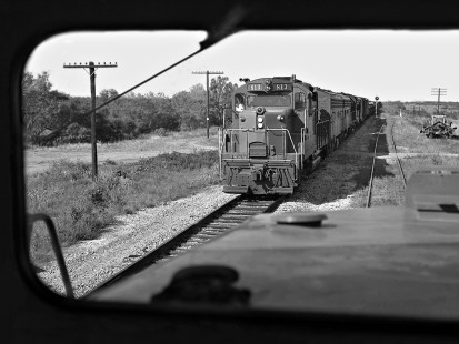 Cab view of Southern Pacific Railroad freight trains passing at Kirby Siding a few miles east of San Antonio, Texas, in July 1965. Today this is the site of large Kirby Yard, built to handle long unit trains. Photograph by J. Parker Lamb, © 2016, Center for Railroad Photography and Art. Lamb-02-051-10