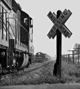 SD24 and Birmingham-bound Southern Railway freight train meets intermodal train on double track north of Meridian, Mississippi, in August 1973. Photograph by J. Parker Lamb, © 2016, Center for Railroad Photography and Art. Lamb-01-111-11