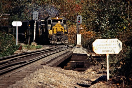 Southbound Clinchfield Railroad coal train led by SD40 locomotive no. 3013 near Sun, Virginia, on October 15, 1980. Photograph by John F. Bjorklund, © 2015, Center for Railroad Photography and Art. Bjorklund-41-18-09