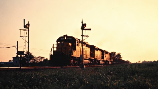 Eastbound Chicago and North Western Railway freight train in Wyeville, Wisconsin, on July 4, 1975. Photograph by John F. Bjorklund, © 2015, Center for Railroad Photography and Art. Bjorklund-28-08-05