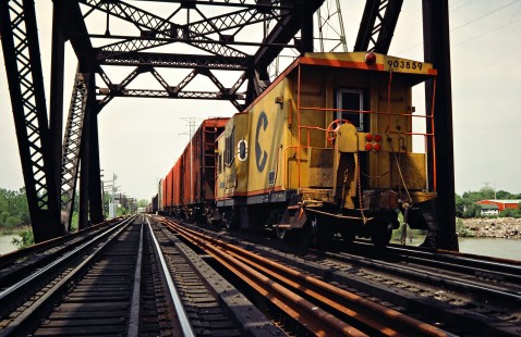 Northbound Chesapeake and Ohio Railway freight train crossing Maumee River in Toledo, Ohio, on May 4, 1984. Photograph by John F. Bjorklund, © 2015, Center for Railroad Photography and Art. Bjorklund-35-21-21