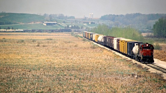 Eastbound Green Bay and Western Railroad freight train near Kewaunee, Wisconsin, on May 15, 1982. Photograph by John F. Bjorklund, © 2015, Center for Railroad Photography and Art. Bjorklund-43-12-22