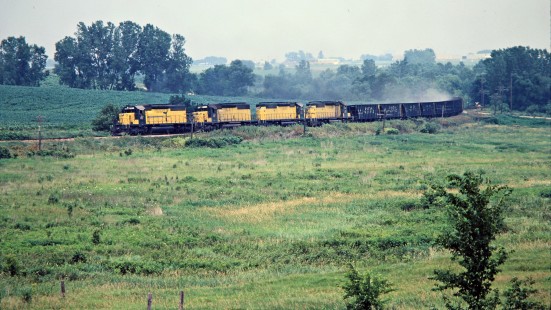 Westbound Chicago and North Western Railway freight train in Des Moines, Iowa, on July 7, 1981. Photograph by John F. Bjorklund, © 2015, Center for Railroad Photography and Art. Bjorklund-28-12-12