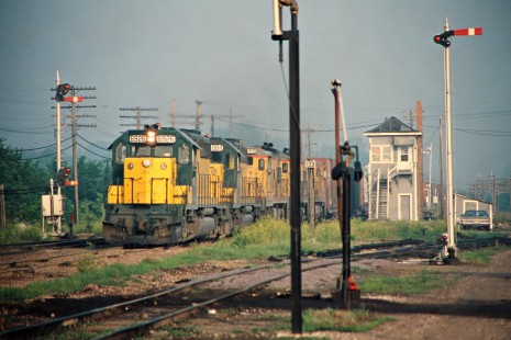 Eastbound Chicago and North Western Railway freight train in Tama, Iowa, on May 30, 1977. Photograph by John F. Bjorklund, © 2015, Center for Railroad Photography and Art. Bjorklund-28-08-04