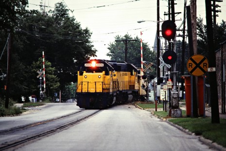 Westbound South Shore Line GP38-2 locomotives entering 11th Street at Michigan City, Indiana, on September 5, 1981. Photograph by John F. Bjorklund, © 2015, Center for Railroad Photography and Art. Bjorklund-42-11-03