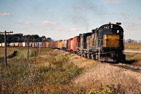 Eastbound Chicago and North Western Railway freight train in Janesville, Minnesota, on October 6, 1979. Photograph by John F. Bjorklund, © 2015, Center for Railroad Photography and Art. Bjorklund-28-13-19