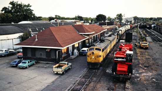 Northbound Chicago and North Western Railway freight train at station in Albert Lea, Minnesota, on October 5, 1979. Photograph by John F. Bjorklund, © 2015, Center for Railroad Photography and Art. Bjorklund-26-13-16
