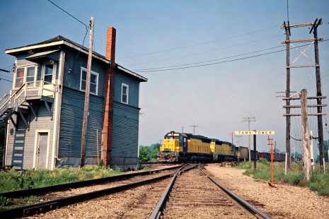 Eastbound Chicago and North Western Railway freight train at Tama Tower in Tama, Iowa, on May 30, 1977. Photograph by John F. Bjorklund, © 2015, Center for Railroad Photography and Art. Bjorklund-28-11-11