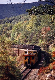Westbound Chesapeake and Ohio Railway freight train in Snowden, Virginia, on October 12, 1980. Photograph by John F. Bjorklund, © 2015, Center for Railroad Photography and Art. Bjorklund-34-24-11