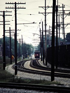 Westbound South Shore Line passenger train at Michigan City, Indiana, on September 6, 1981.  Photograph by John F. Bjorklund, © 2015, Center for Railroad Photography and Art. Bjorklund-42-13-16