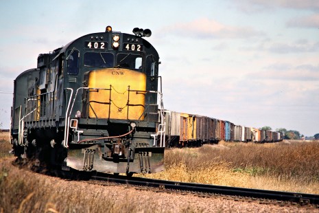 Eastbound Chicago and North Western Railway freight train in Eagle Lake, Minnesota, on October 6, 1979. Photograph by John F. Bjorklund, © 2015, Center for Railroad Photography and Art. Bjorklund-26-15-03