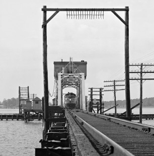Mobile-bound Louisville and Nashville Railroad freight train eases across long timber trestle over Biloxi Bay, Tennessee, in August 1960. Photograph by J. Parker Lamb, © 2016, Center for Railroad Photography and Art. Lamb-01-140-10