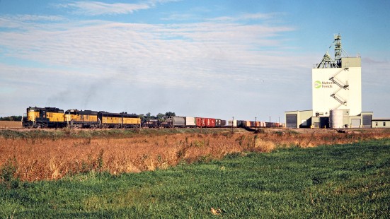 Southbound Chicago and North Western Railway freight train in New Richland, Minnesota, on October 6, 1979. Photograph by John F. Bjorklund, © 2015, Center for Railroad Photography and Art. Bjorklund-28-12-05