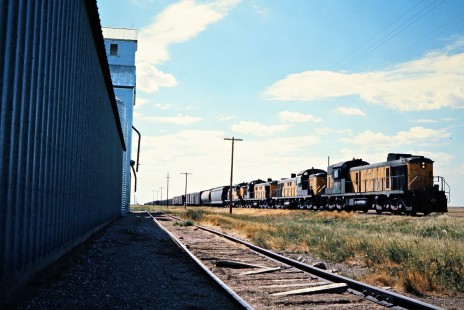 Eastbound Chicago and North Western Railway freight train in Holabird, South Dakota, on July 24, 1976. Photograph by John F. Bjorklund, © 2015, Center for Railroad Photography and Art. Bjorklund-25-13-16.