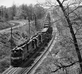 Eastbound Southern Railway freight train climbing the grade on doubletrack main line from downtown Birmingham, Alabama, to Norris Yard in January 1964. Single track at left is Seaboard Air Line Railroad main line to downtown. Photograph by J. Parker Lamb, © 2016, Center for Railroad Photography and Art. Lamb-01-116-04
