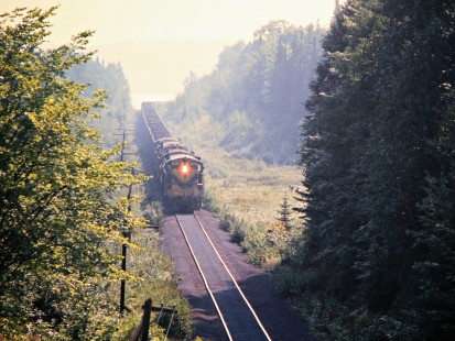 Chicago and North Western Railway ore train at Goose Lake, Michigan, on September 1, 1973. Photograph by John F. Bjorklund, © 2015, Center for Railroad Photography and Art. Bjorklund-24-04-20.