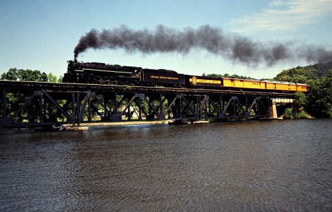 Westbound Chesapeake and Ohio Railway passenger excursion train led by stream locomotive no. 614 crossing Thornapple River in McCord, Michigan, on June 6, 1981. Photograph by John F. Bjorklund, © 2015, Center for Railroad Photography and Art. Bjorklund-35-06-08
