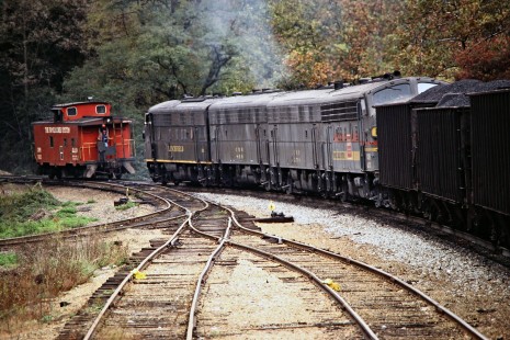 After assisting a southbound coal train up the Blue Ridge Mountains, a set of four Clinchfield Railroad F-unit helper locomotives is cutting off at Altapass, North Carolina, on October 17, 1980. Photograph by John F. Bjorklund, © 2015, Center for Railroad Photography and Art. Bjorklund-41-24-17
