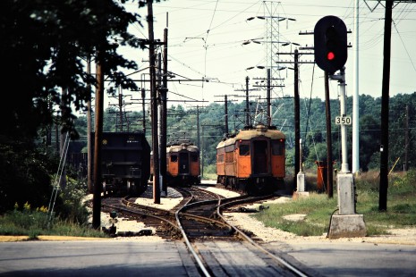 Eastbound and westbound South Shore Line passenger trains meeting in Michigan City, Indiana, on September 7, 1981. Photograph by John F. Bjorklund, © 2015, Center for Railroad Photography and Art. Bjorklund-42-14-07