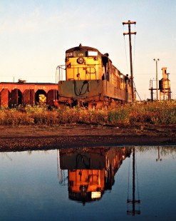 Chicago and North Western Railway Fairbanks-Morse locomotive no. 1693 at the roundhouse in Escanaba, Michigan, on August 17, 1974. Photograph by John F. Bjorklund, © 2015, Center for Railroad Photography and Art. Bjorklund-24-09-07.