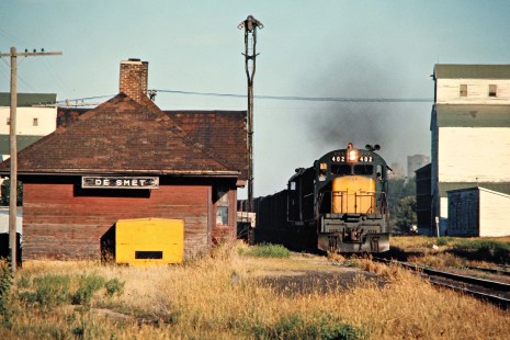 Eastbound Chicago and North Western Railway freight train in De Smet, South Dakota, on July 24, 1976. Photograph by John F. Bjorklund, © 2015, Center for Railroad Photography and Art. Bjorklund-28-11-20