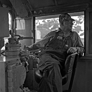 Alaska Railroad engineer Kenny Fuller inside cab, c. 1968. Photograph by Leo King, © 2015, Center for Railroad Photography and Art. King-03-019-003