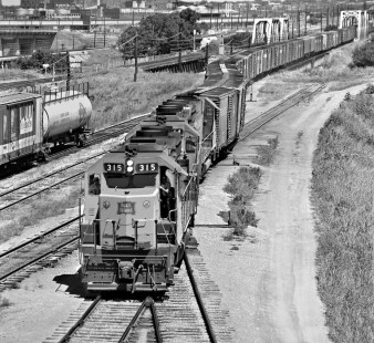 Alternate view of inbound Chicago, Rock Island and Pacific Railroad freight train at Peach Yard in Fort Worth, Texas, in August 1969. Photograph by J. Parker Lamb, © 2016, Center for Railroad Photography and Art. Lamb-02-074-04
