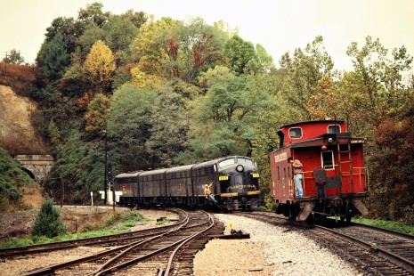 After assisting a train up the Blue Ridge Mountains, a set of four Clinchfield Railroad F-unit locomotives is cutting off at Altapass, North Carolina, on October 17, 1980. Photograph by John F. Bjorklund, © 2015, Center for Railroad Photography and Art. Bjorklund-41-24-03